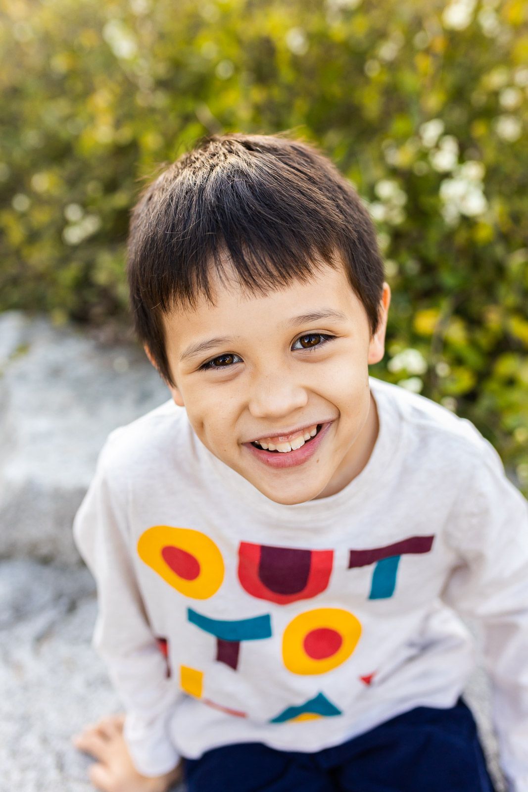 Portrait of a boy in a garden