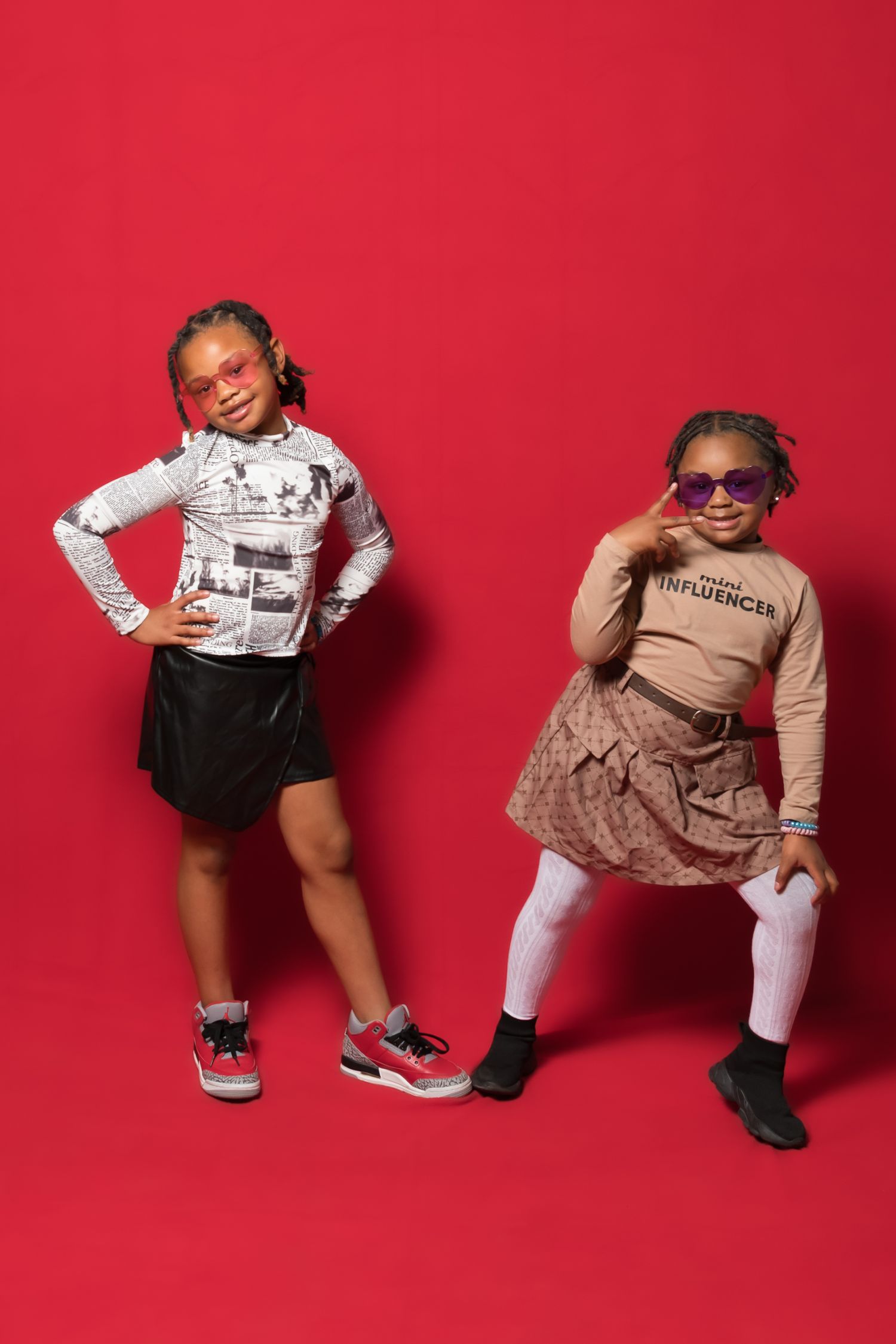 Child modeling various stylish outfits in dynamic poses against red background.