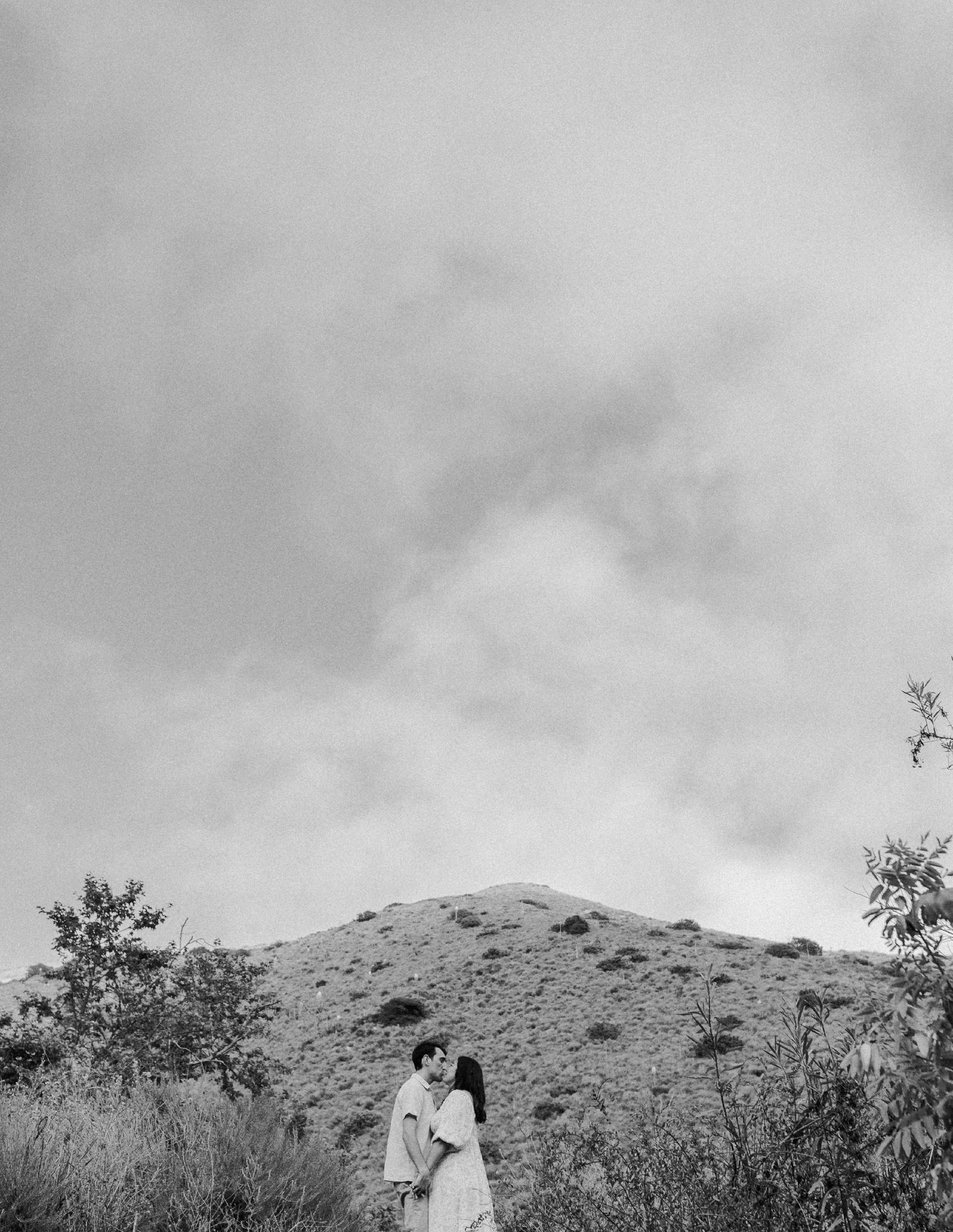 E. Noelle Photography couple engagement in the Los Angeles Malibu hills looking out at mountain
