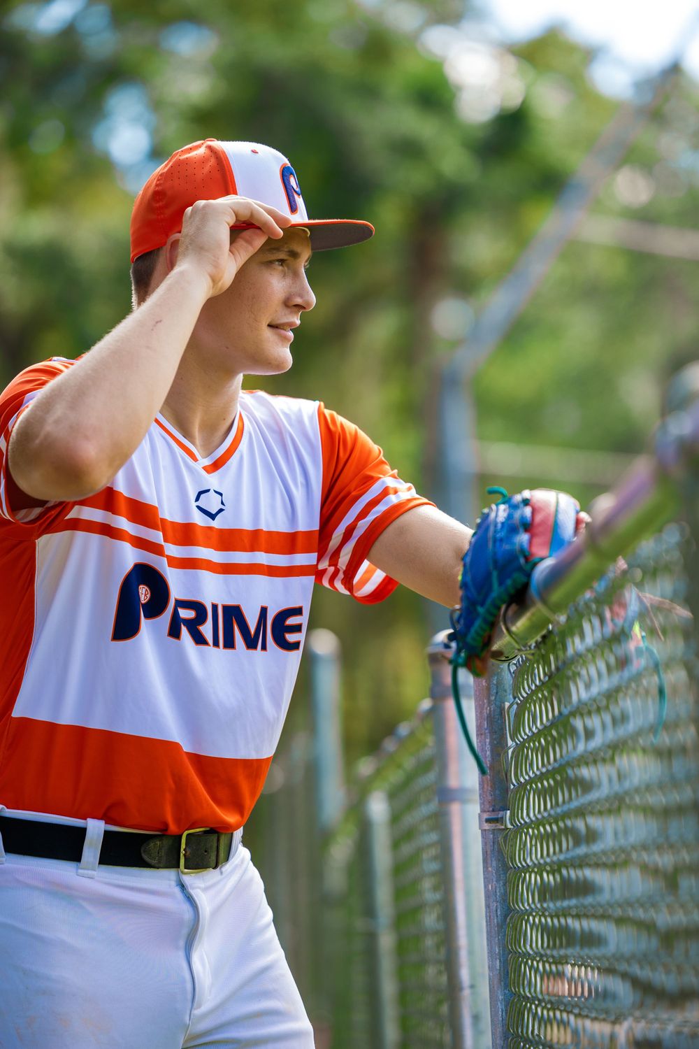 Awesome senior photograph of a high school senior in his baseball uniform.