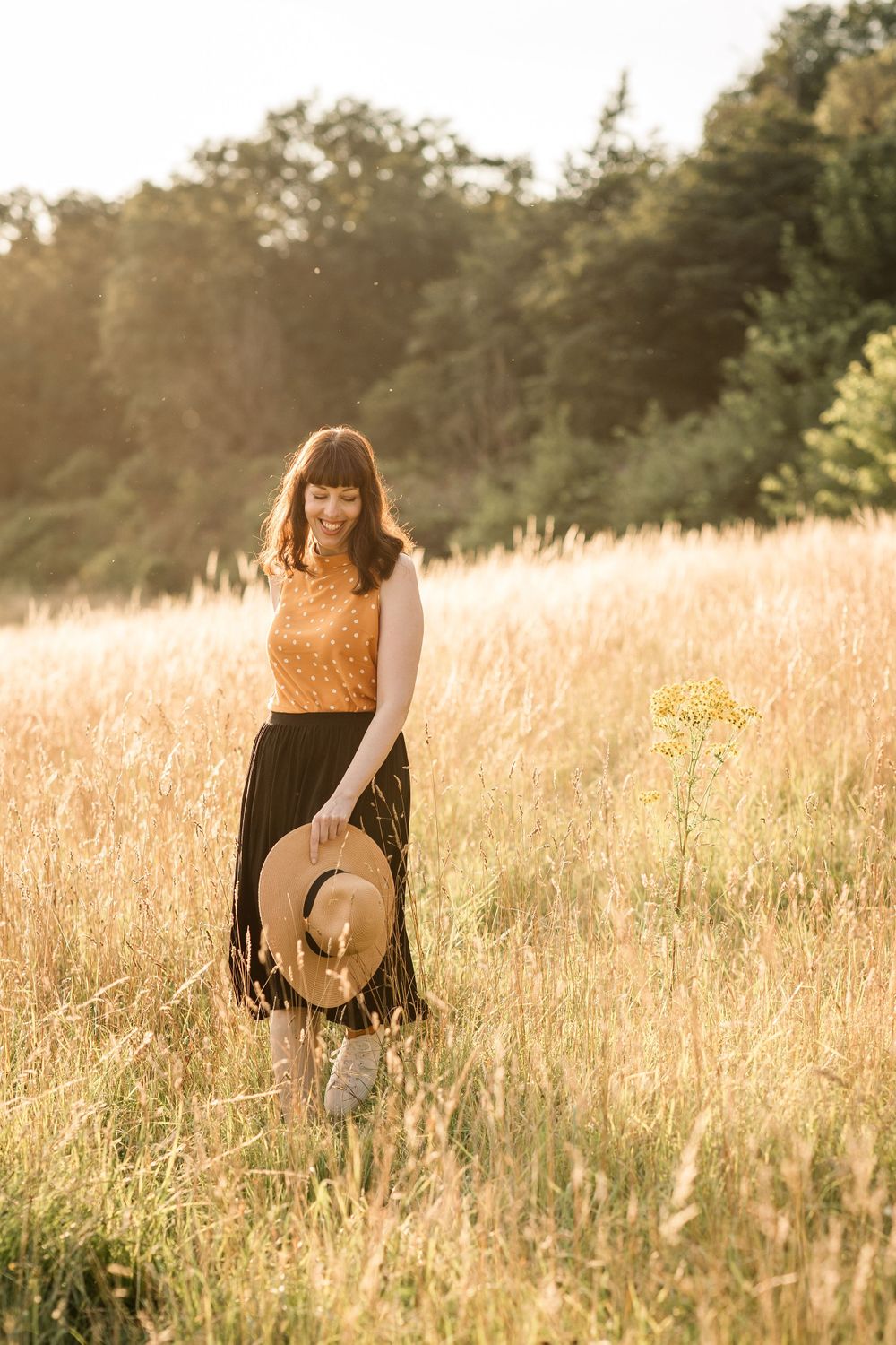 Brand Photographer in Hertfordshire Becky Harley Creative Melina walking in long grass on brand shoot