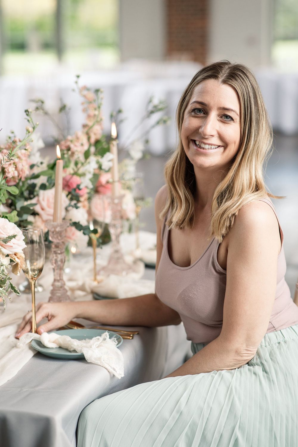 Brand Photographer in Hertfordshire Becky Harley Creative Sara sitting at styled wedding table on brand shoot