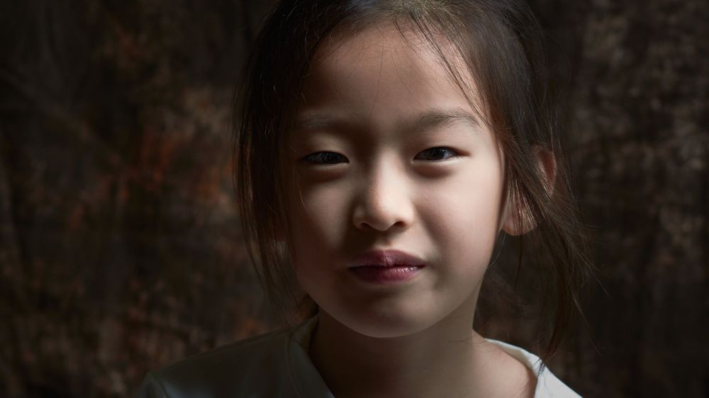 Hester headshot Chinese girl birthday photos hyperactive kid fun collaborative game