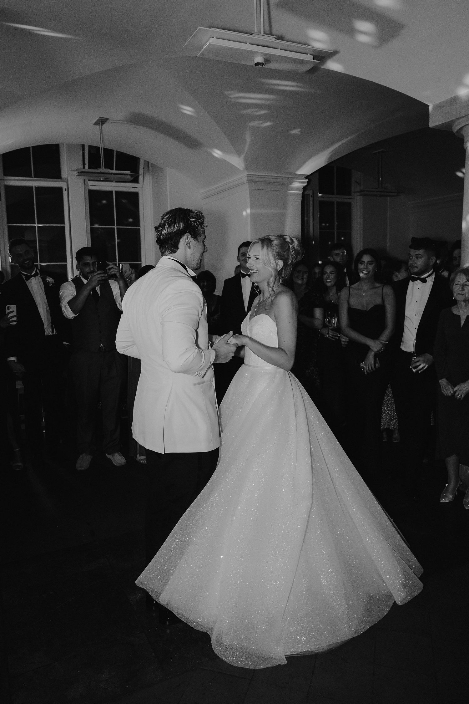 bride and groom dancing in the vaults at the ashmolean museum in Oxford