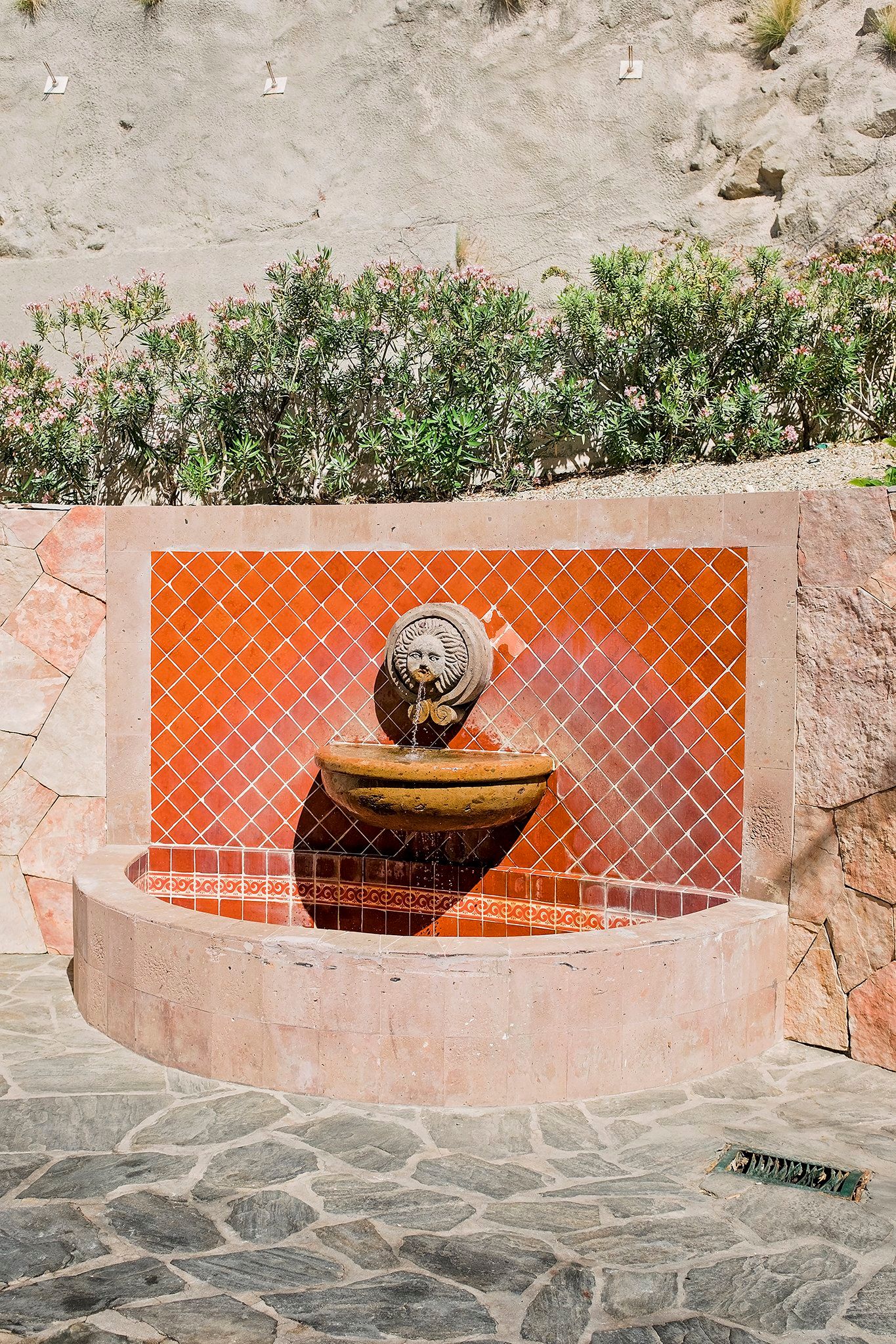 A Sun statue fountain, located near our suite.