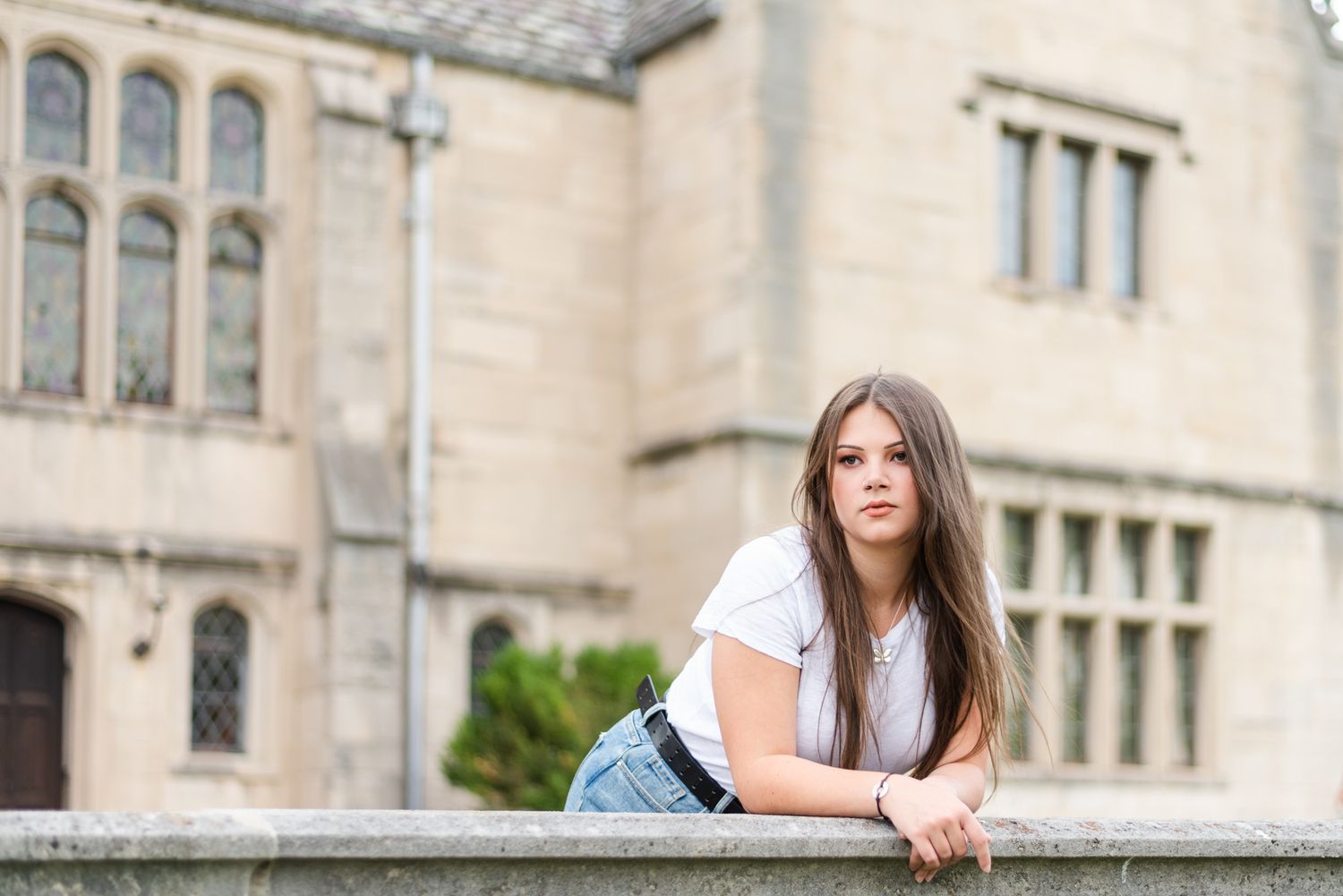 Young woman looking away somber at Hartwood Acres in Pittsburgh Pennsylvania
