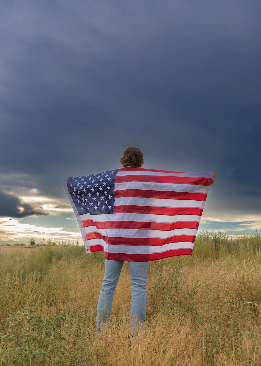 Senior boy American flag storm portrait Air Force Colorado