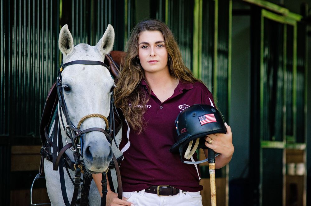 Polo player and thoroughbred mare horse