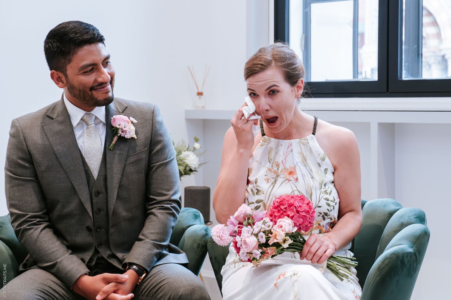 Bride wiping tears