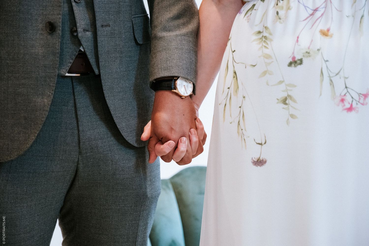 Bride and groom holding hands