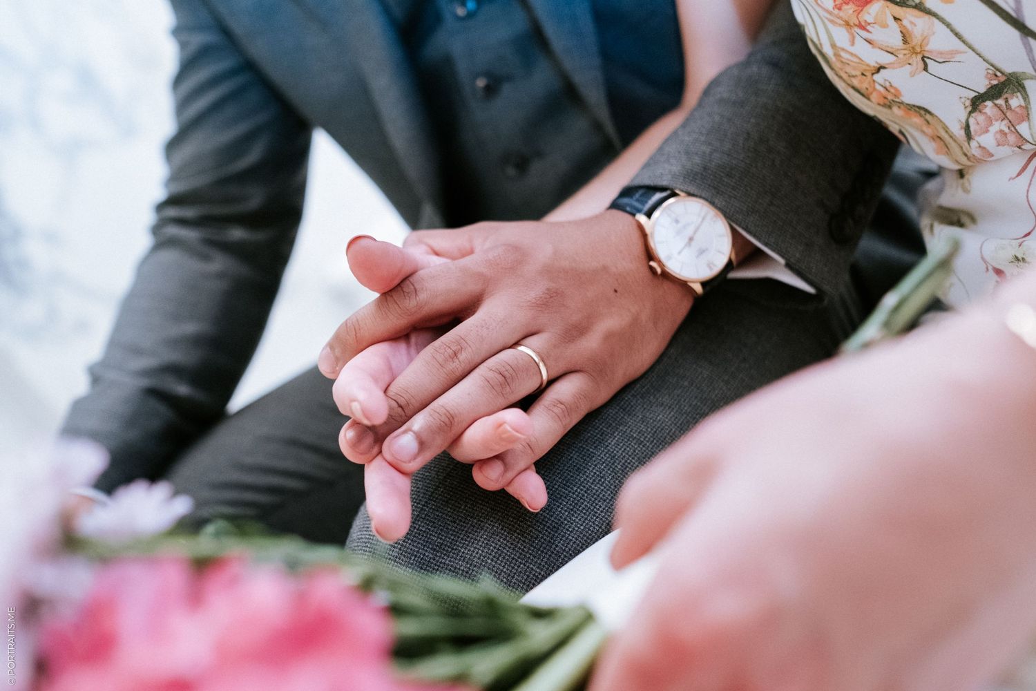 Newly weds holding hands
