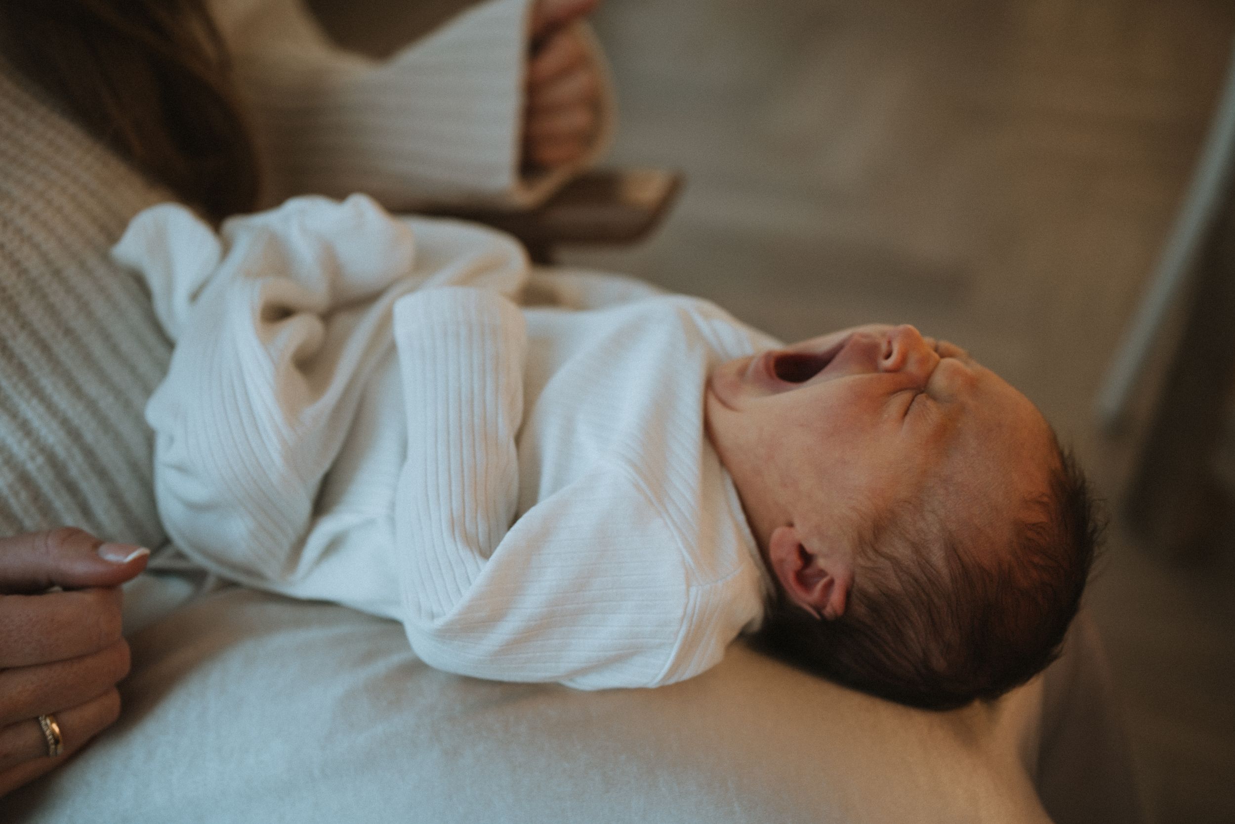 newborn baby yawning