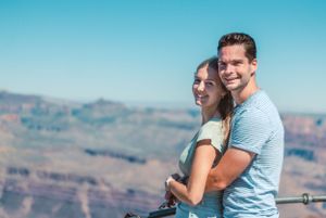 Destination travel photo of couple at the Grand Canyon in Arizona