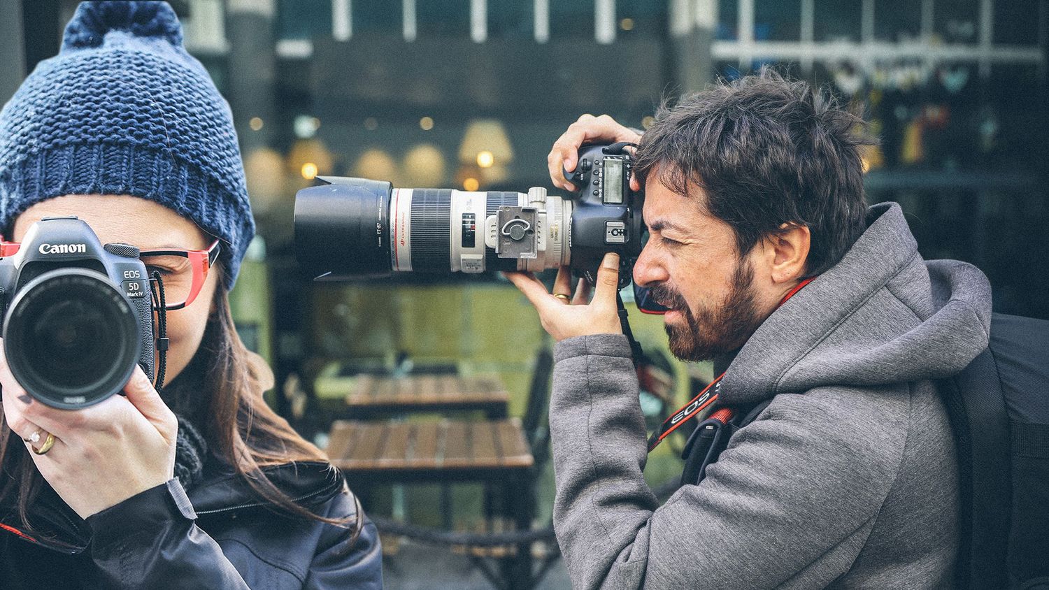 Two photographers with professional cameras capturing shots outdoors.
