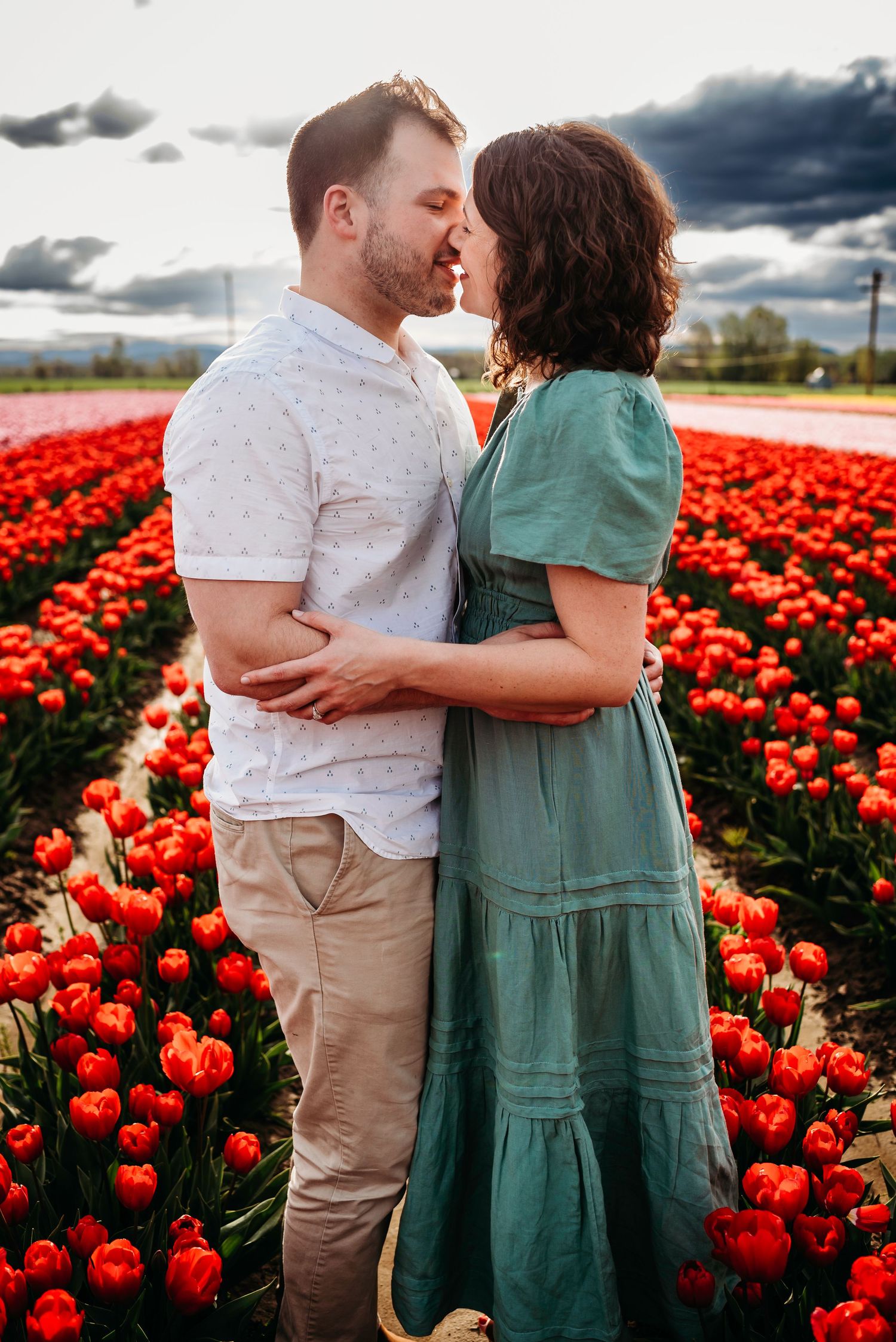 In love couple at the Tulip Fields in Woodland, Washington.