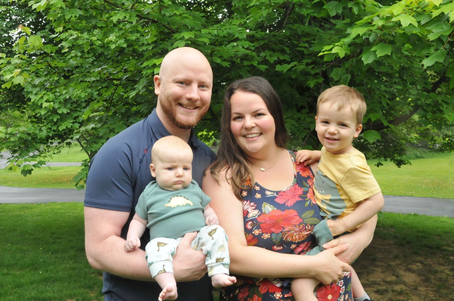 Photograph of family with two small sons