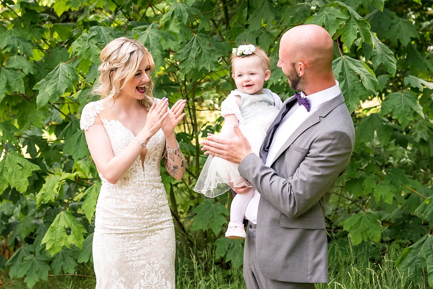Celebrating the first look together on their wedding day. Photo taken at Hope Golf Course by Kari Mills Photography.