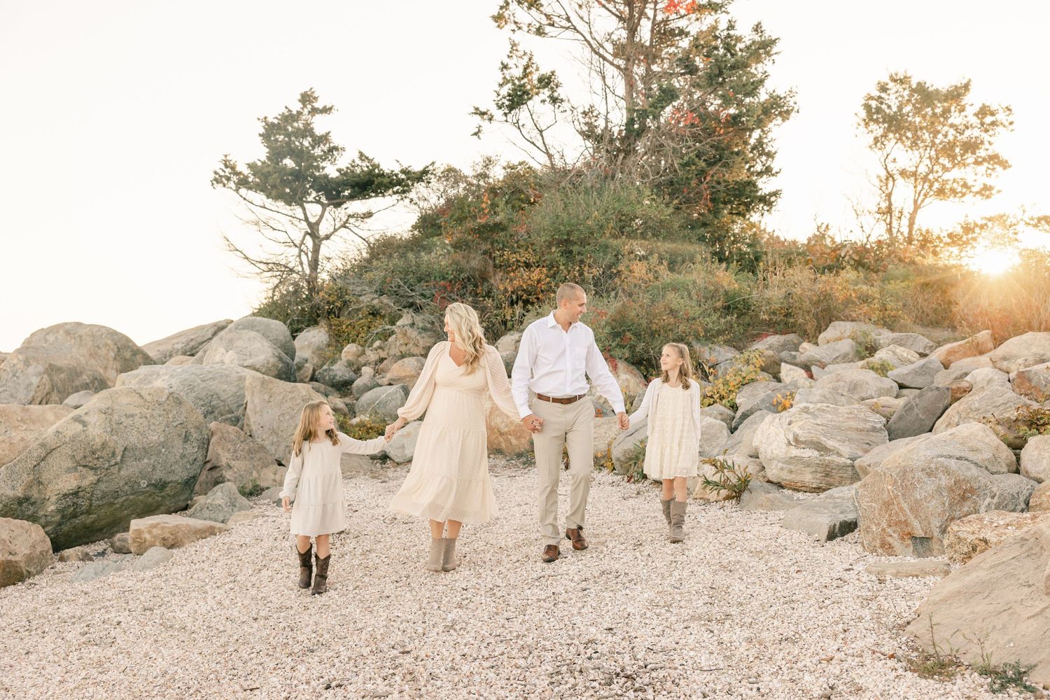 Family walking on the beach in Connecticut, Ashley Nielsen Studio.