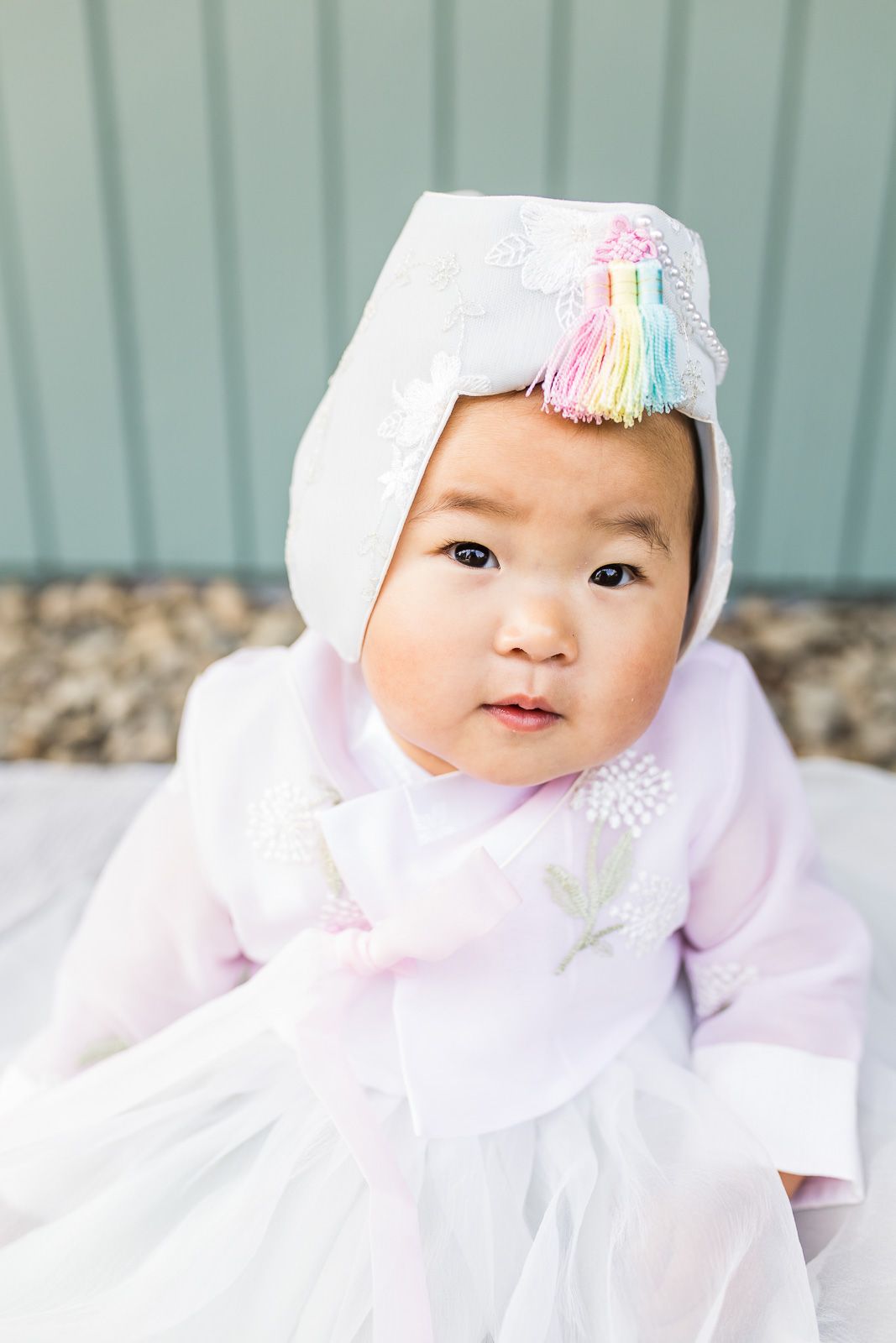 Birthday party photographer captures one year old in her traditional hanbok