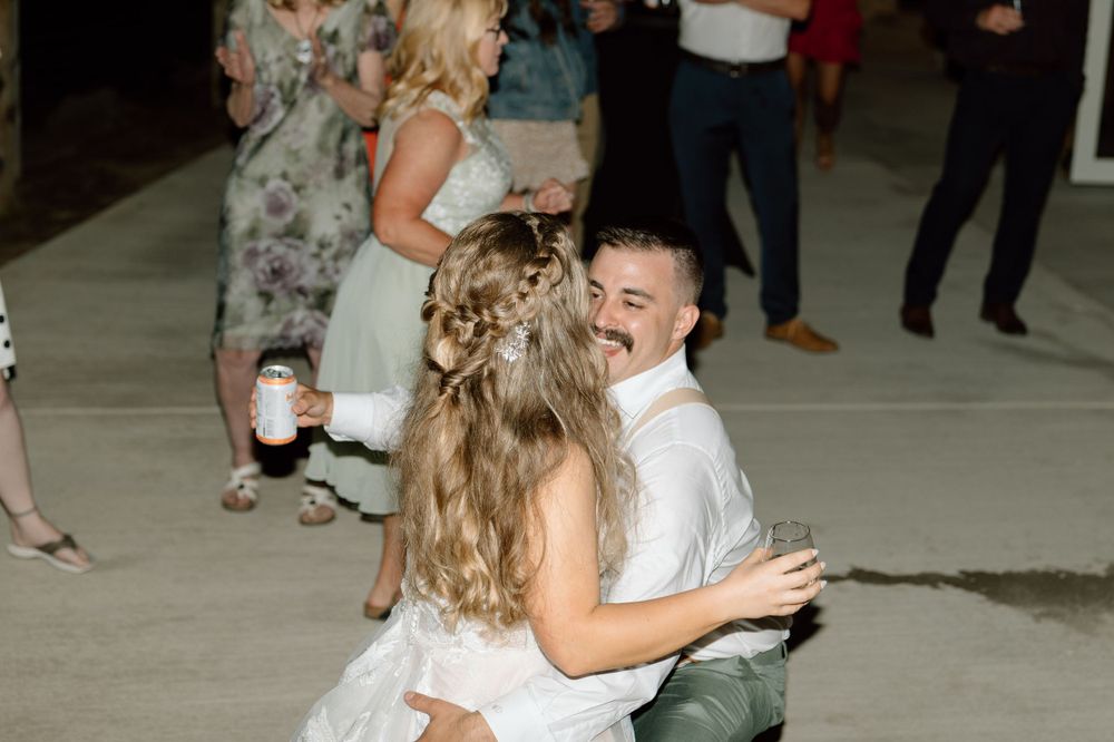 Bride and groom dropping low on the dance floor