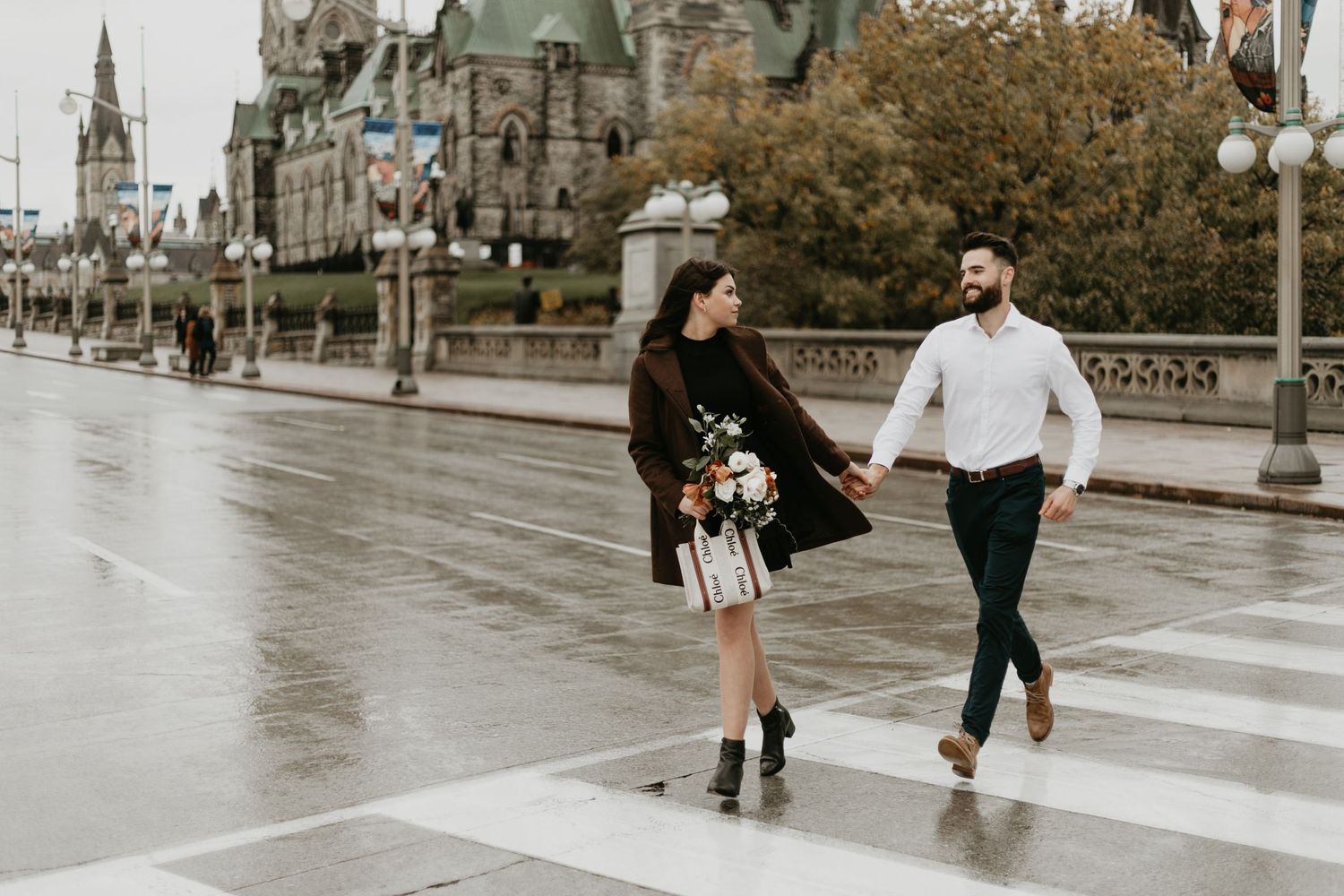 Downtown Ottawa engagement session, couple holding hands
