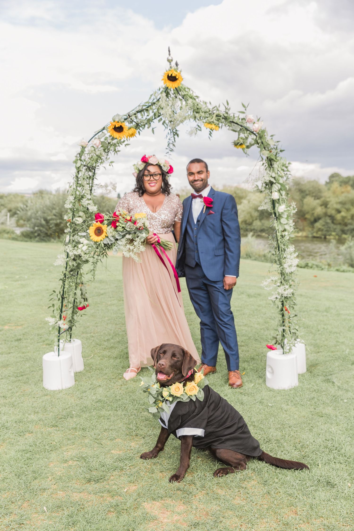 Hayley Elizabeth Photography Dogs at weddings bride and groom portrait with labrador at riverside Gloucestershire