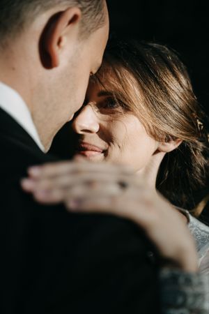 Bride smiling to her groom in their special day.