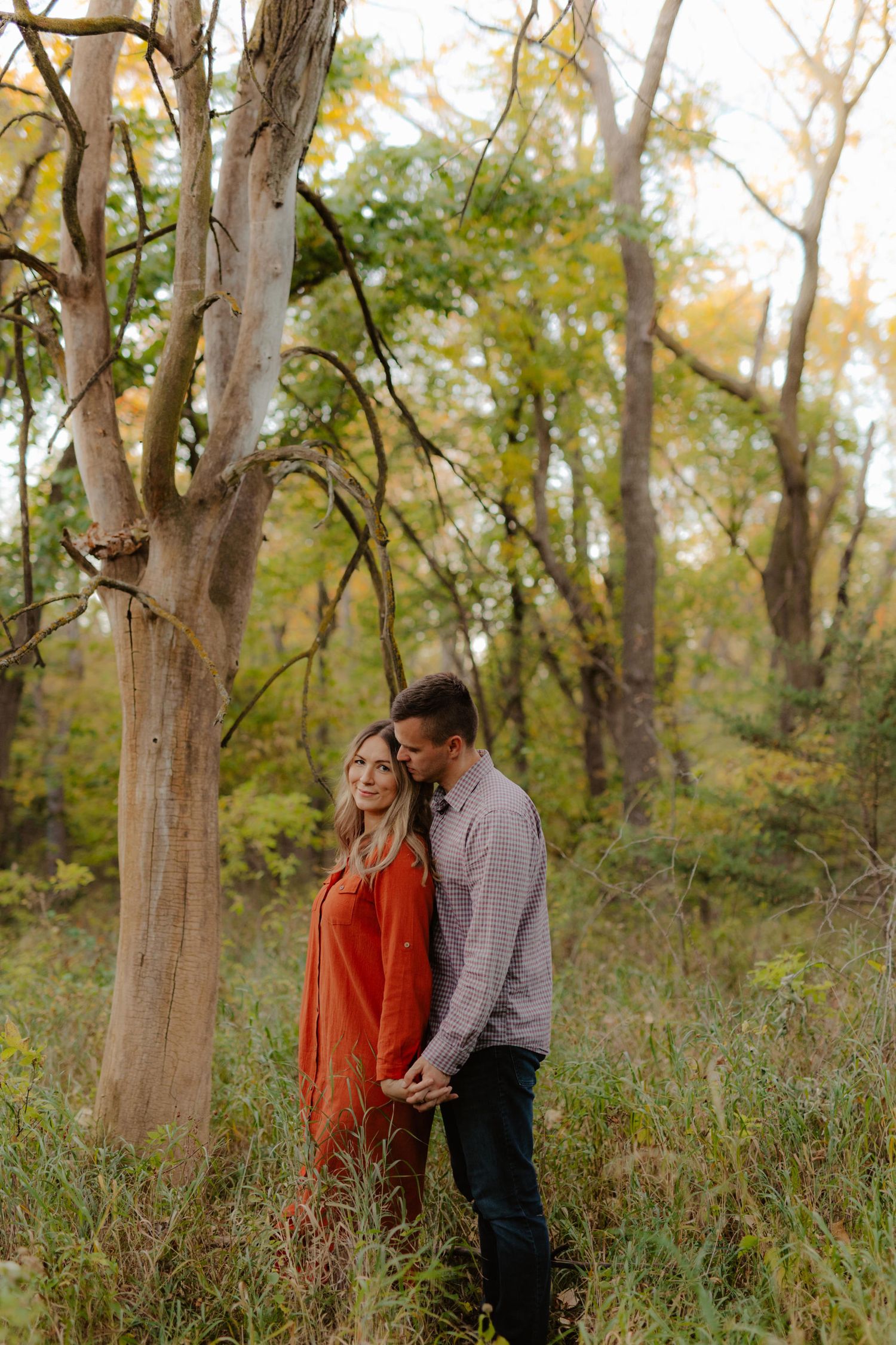 forest family photos couples posing holding hands