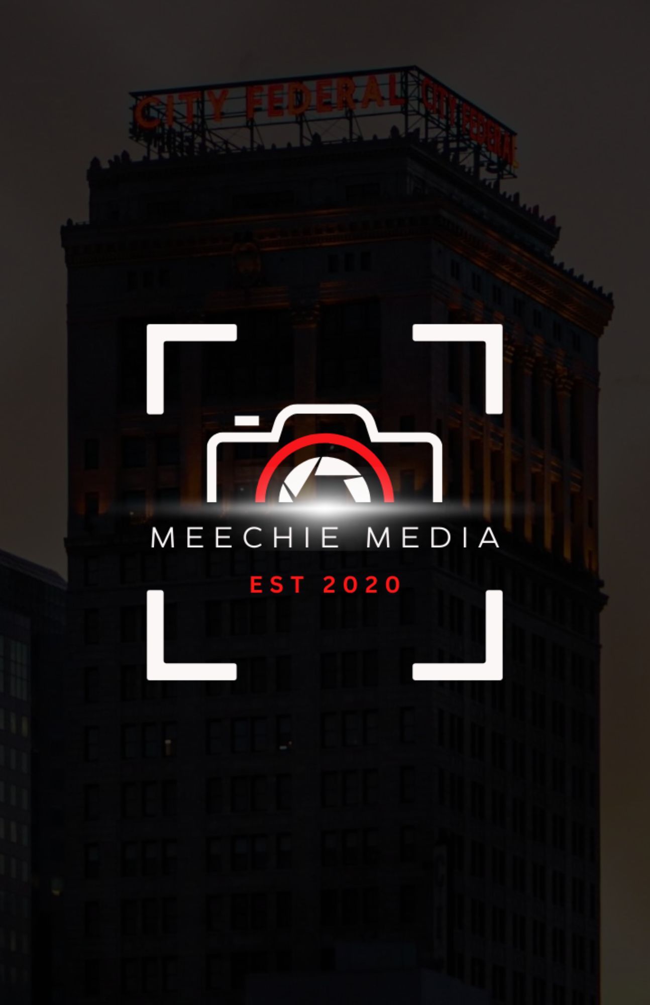 Dark cityscape with camera logo design for Meeche Media established 2020.