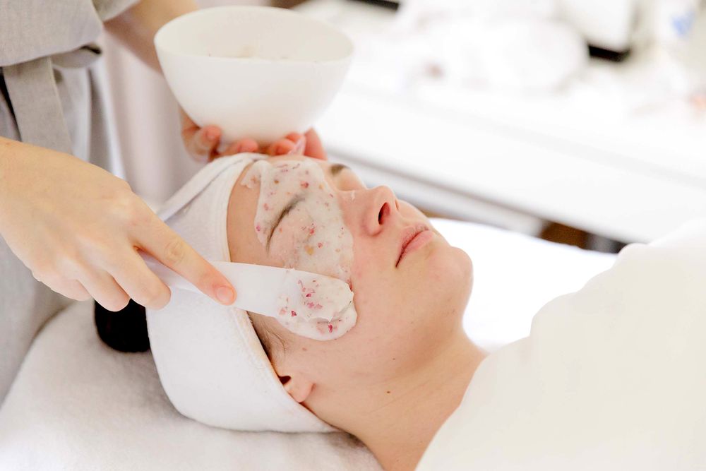Professional massage therapist providing a relaxing treatment at an Adelaide wellness studio.