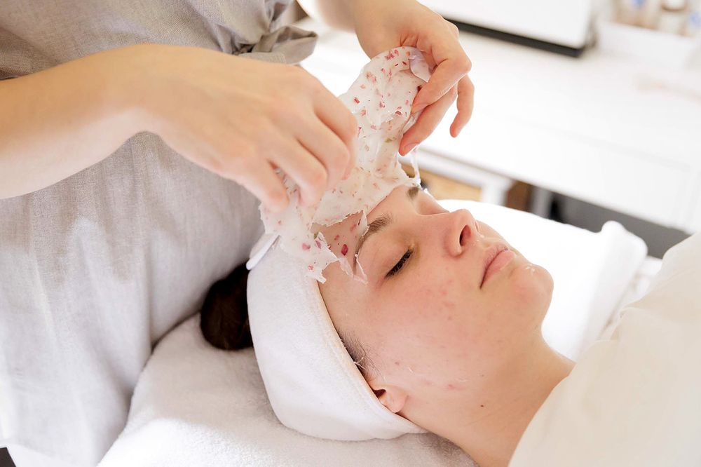 Professional massage therapist providing a relaxing treatment at an Adelaide wellness studio.