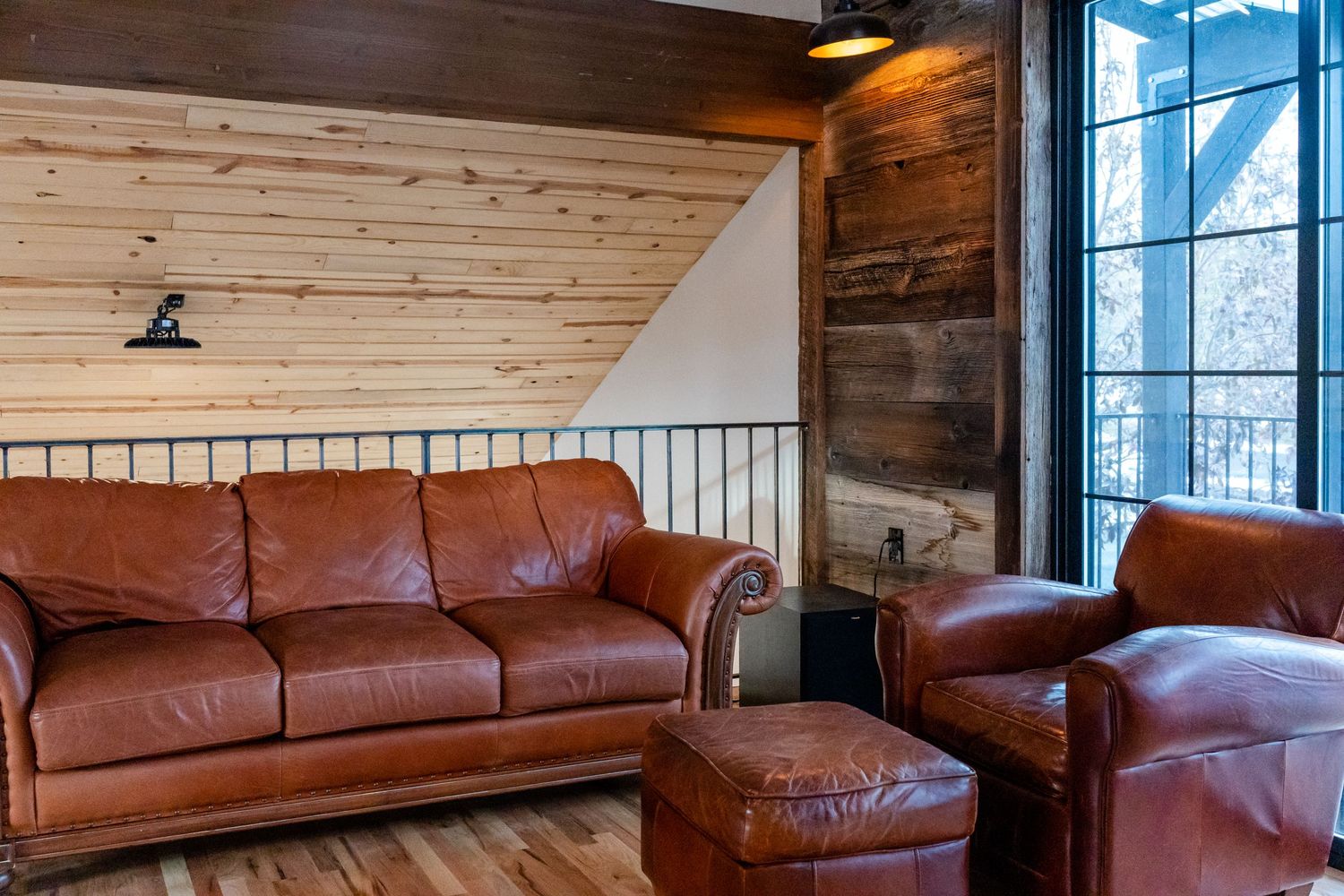 balcony with sliding door and couches