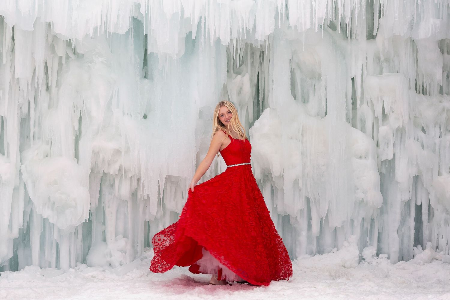high school senior davis high school utah in red prom dress at Ice Castles in utah