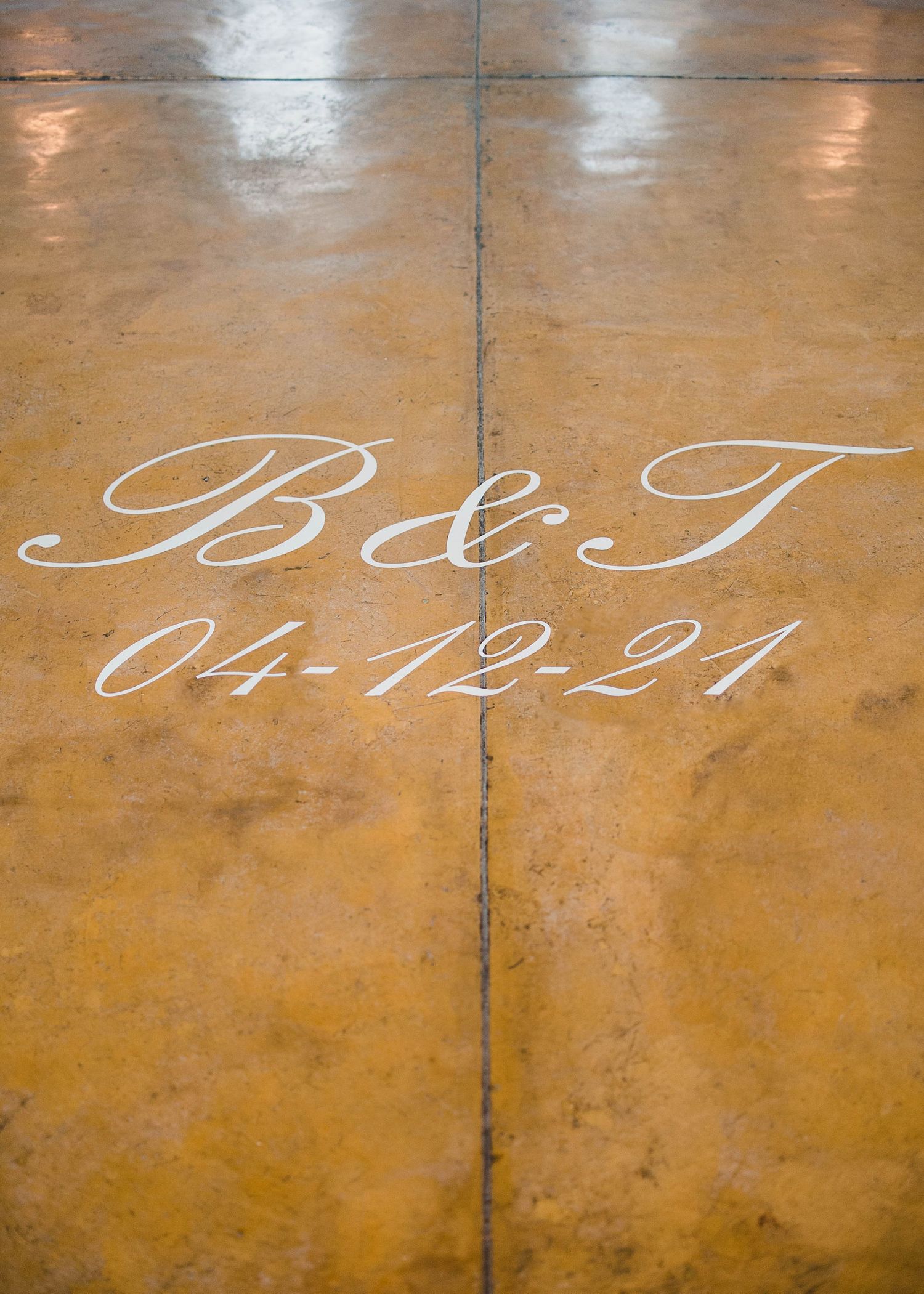 dance floor detail with bride and groom initials.