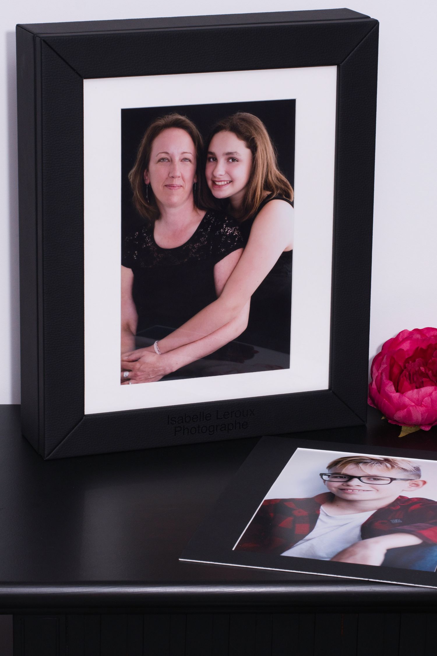 Clear cover folio box for 20 of your matted portraits that can be displayed in your home.  Front portrait can be changed