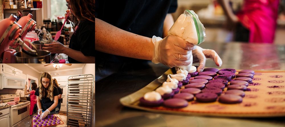 Preparing pink macarons with piping bags in professional kitchen setting.