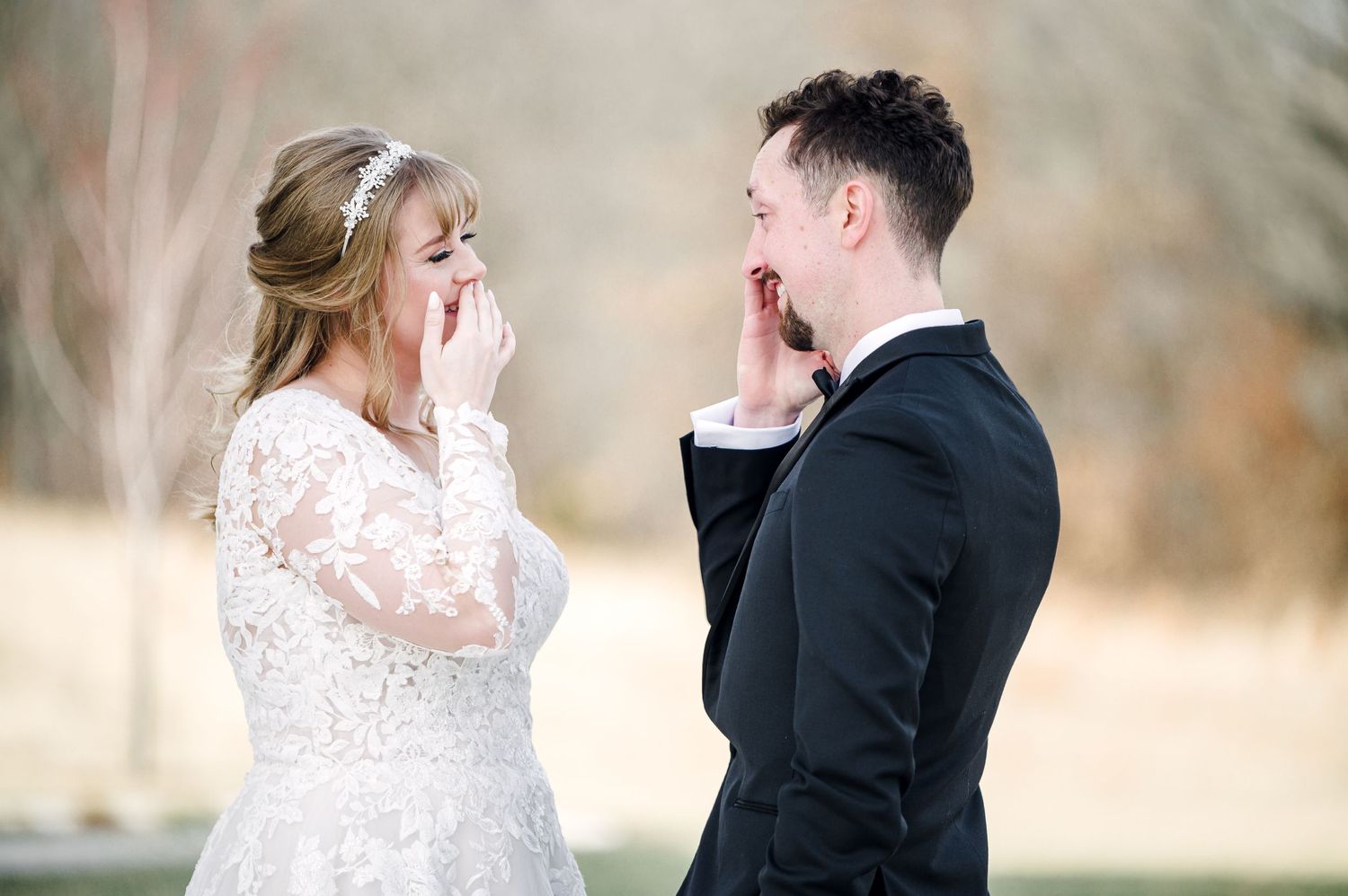 A couple reacts with joyful emotion during their wedding first look in soft natural light by Stephanie Coulter Photography