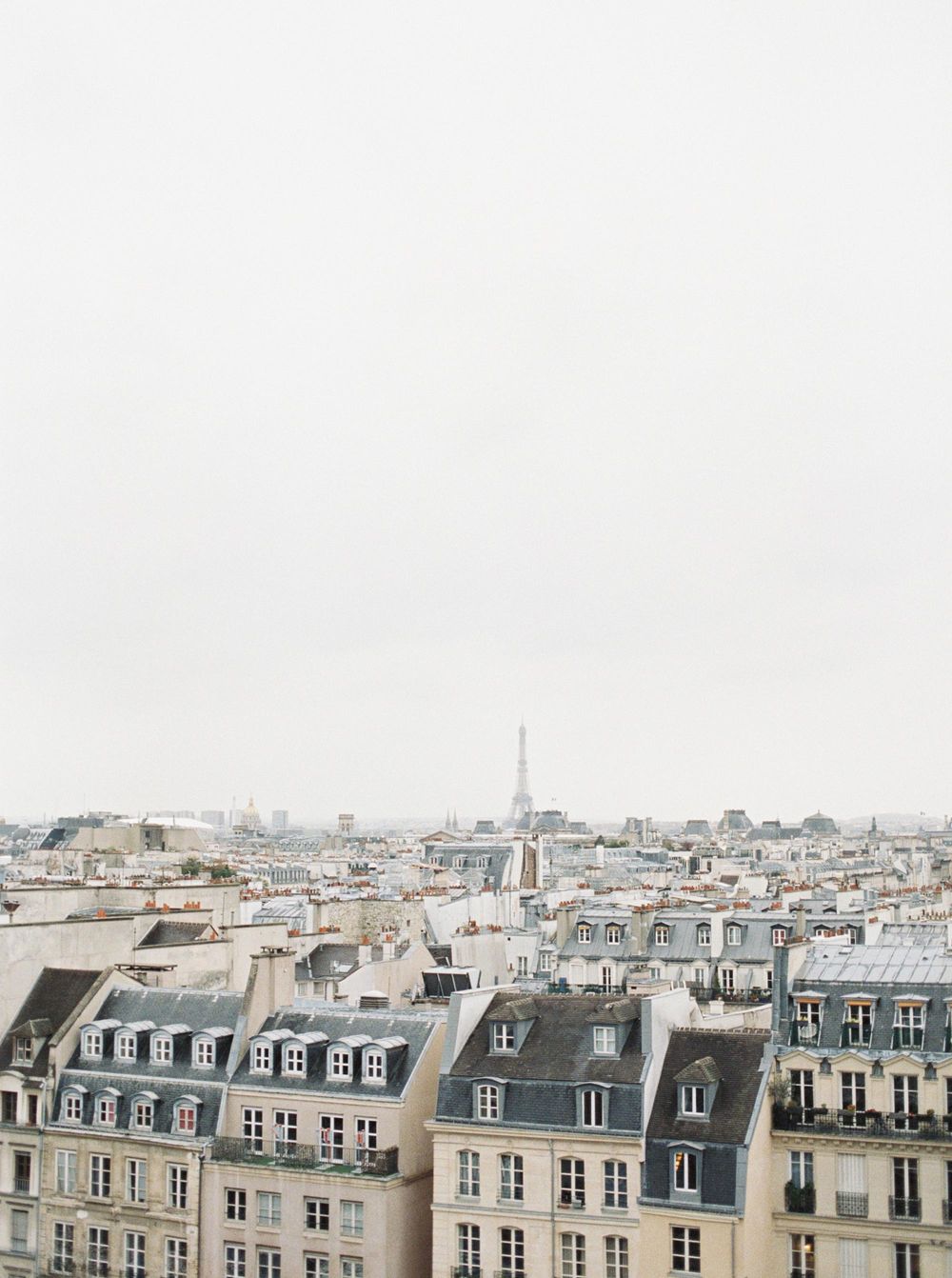 Panoramic shot of Paris, France showcasing beautiful architecture and scenic river.