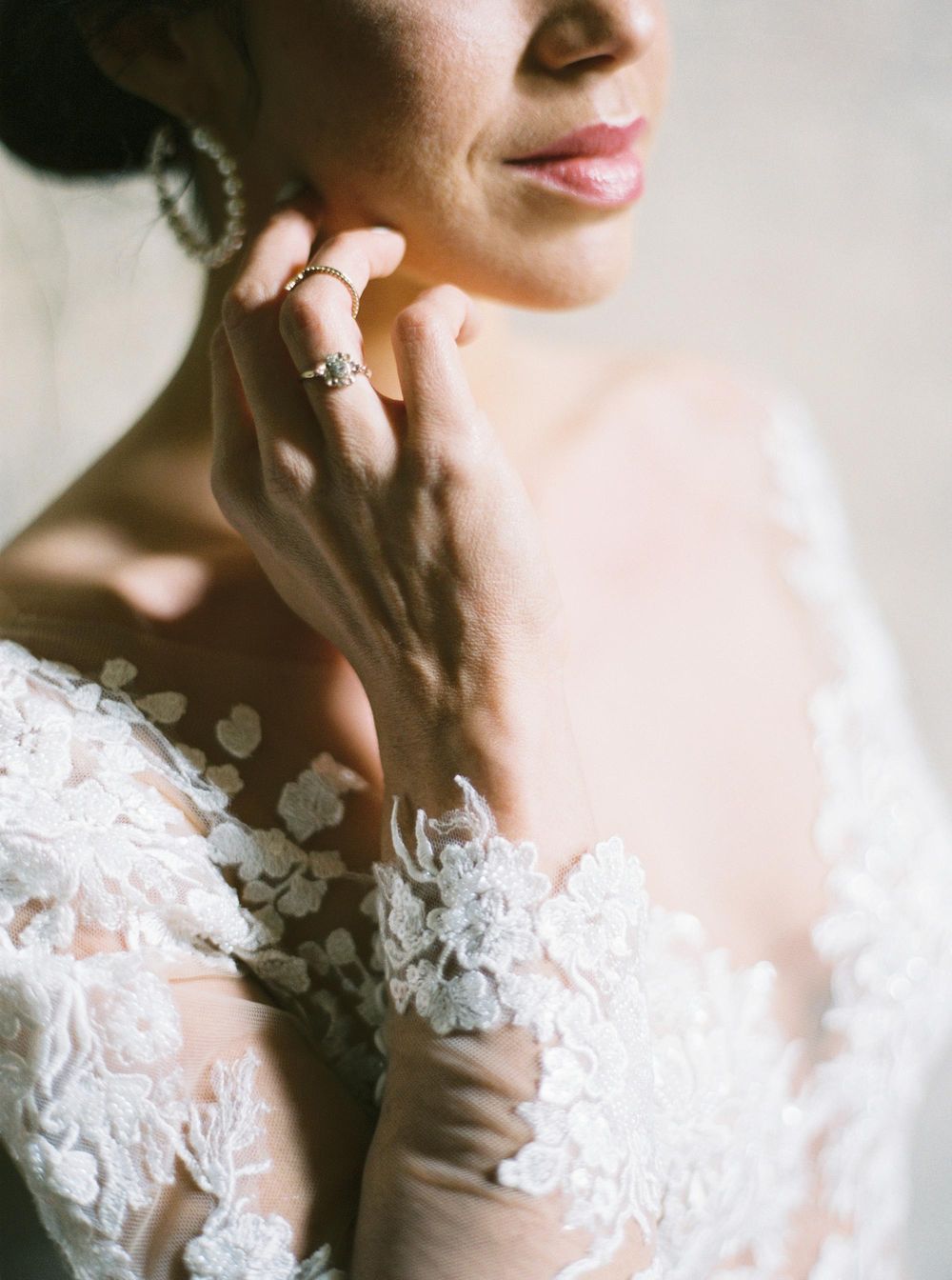 Stunning bride in lace dress at Louvre, Paris.