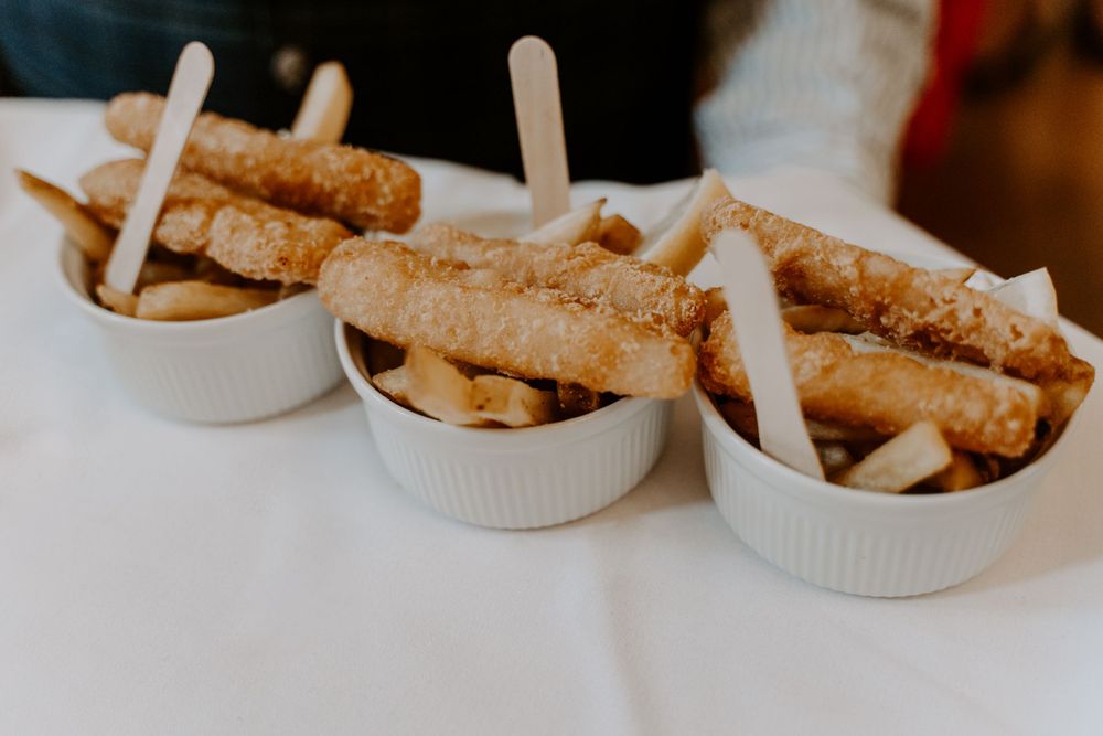 Small pots of wedding canapes. Fish and chips.