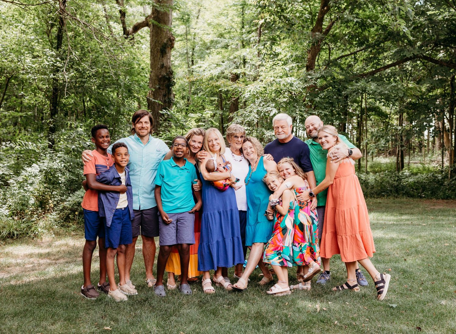 Extended Family hugging near the tree in Tipton, Indiana