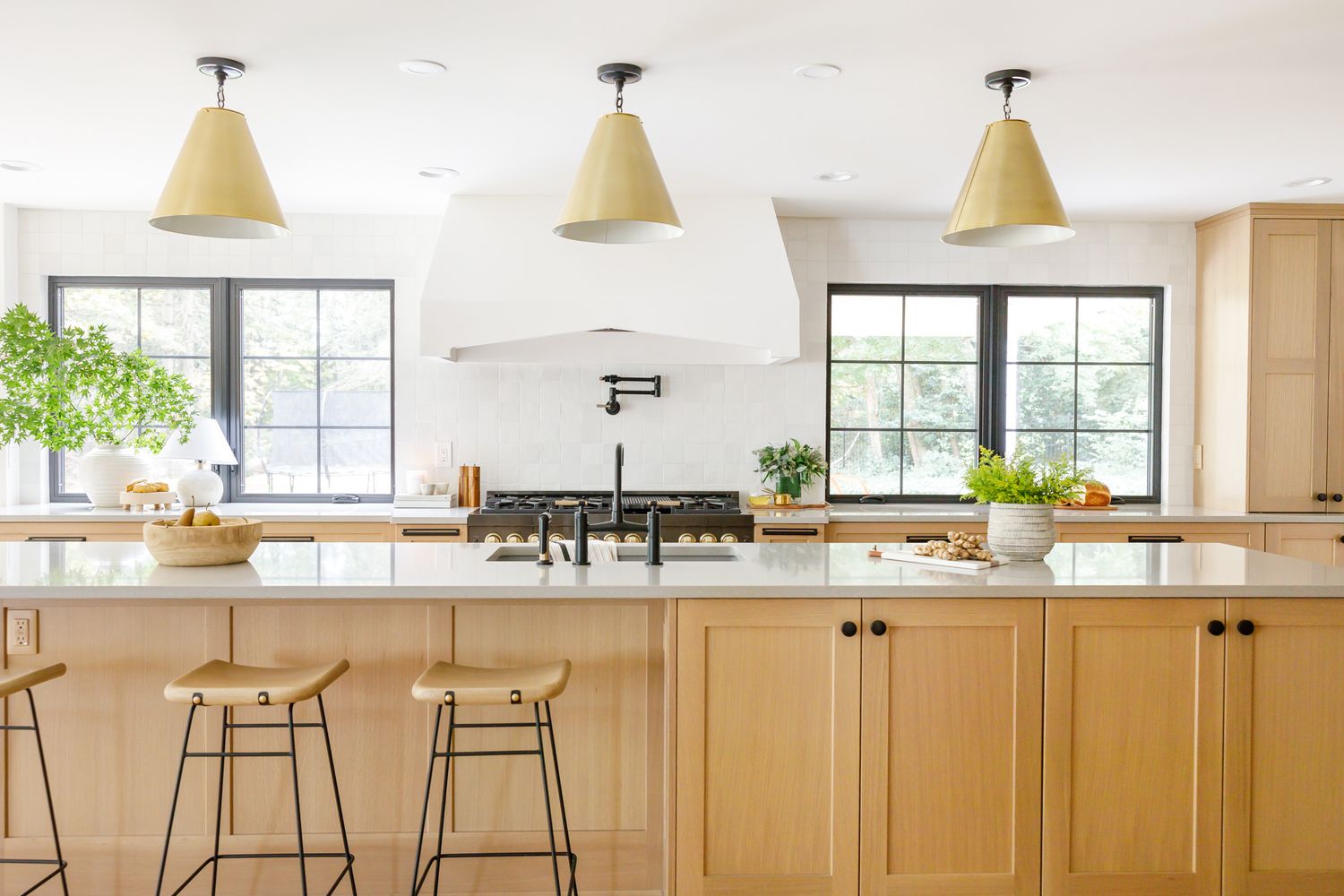H. Bero Interior Design photos kitchen with bar stools and overhead lights in Bellevue, WA