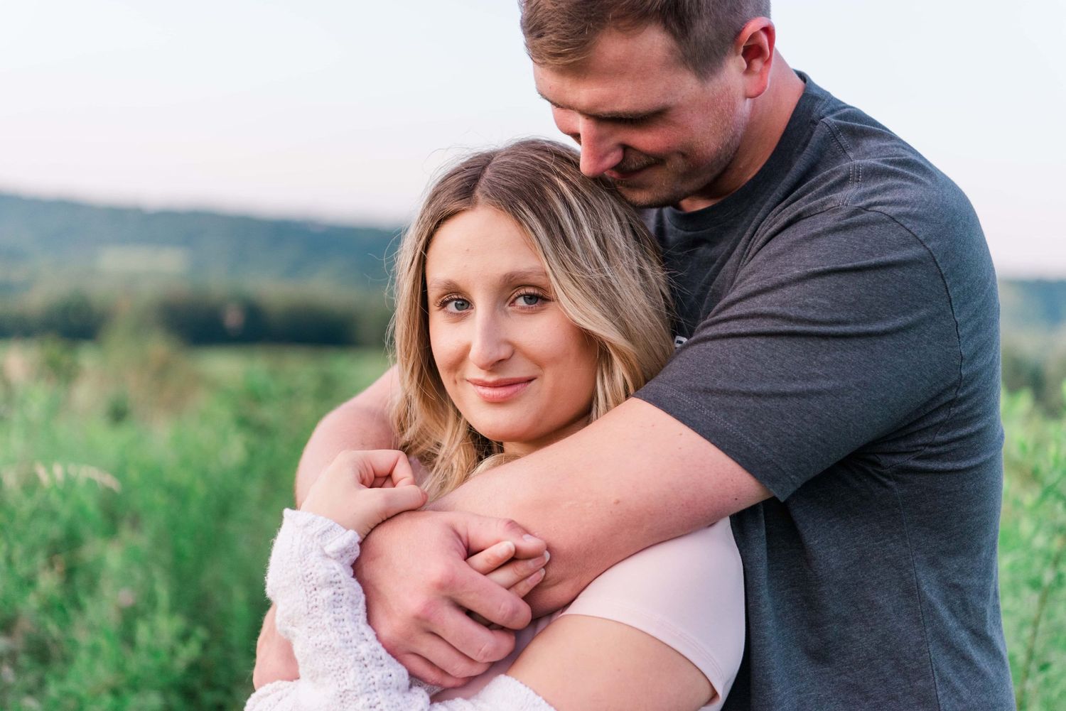 Pittsburgh summer engagement photos in a field