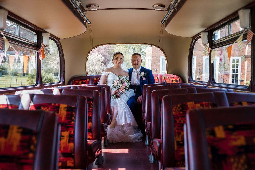 Couple portraits on a classic bus at their Kelham House wedding