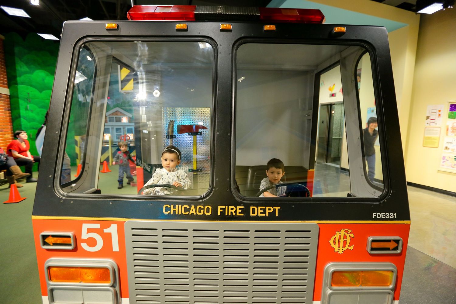 Vintage Chicago CTA transit train car number 51 displayed in a museum-like setting.