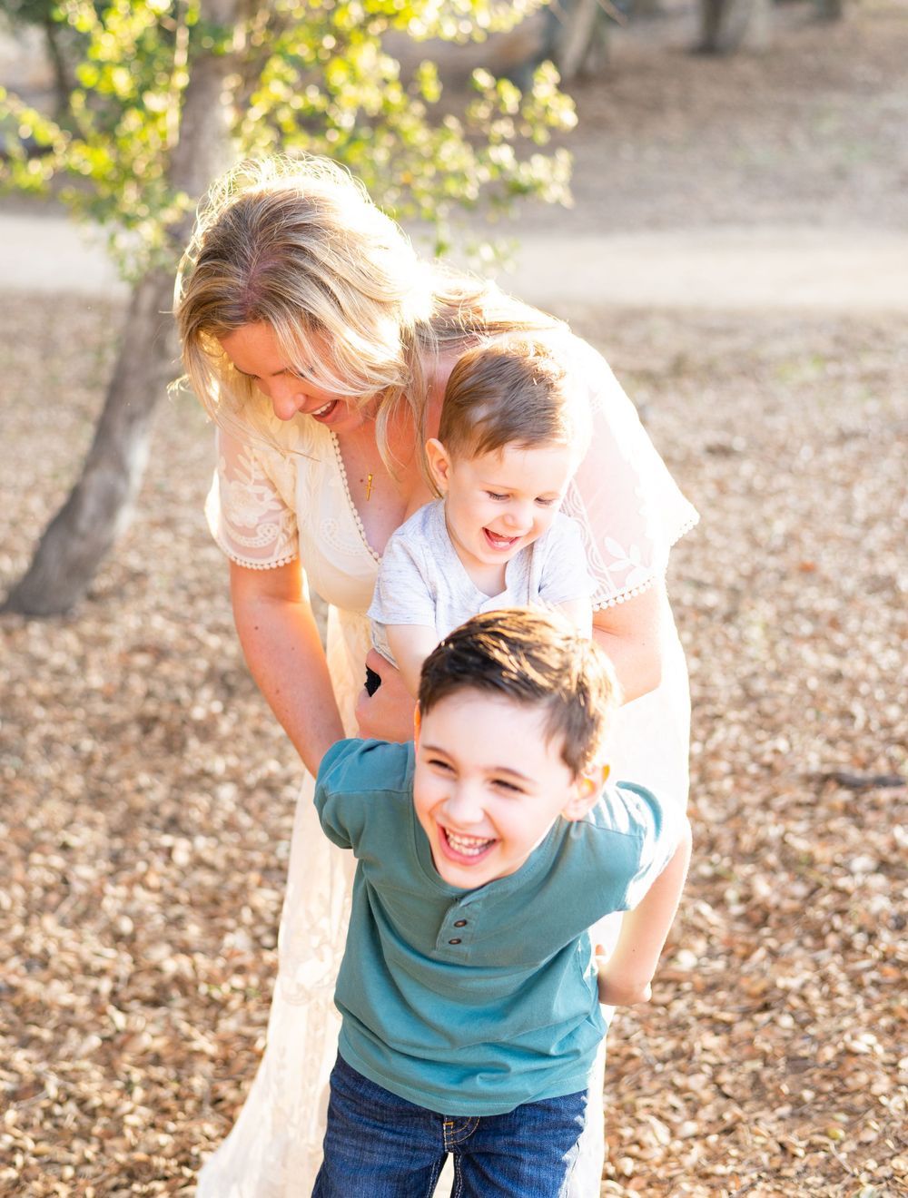 A mom and her crazy boys. Mother and me photo taken by Ashley Ann Imagery in Redlands Ca.
