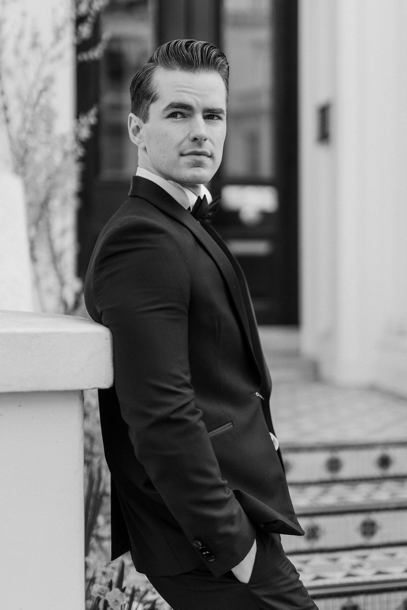 Groom posing in wedding suit during London wedding