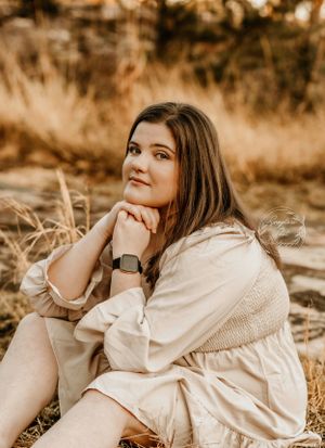 Portrait series in sepia tones showing contemplative poses against a natural outdoor backdrop.