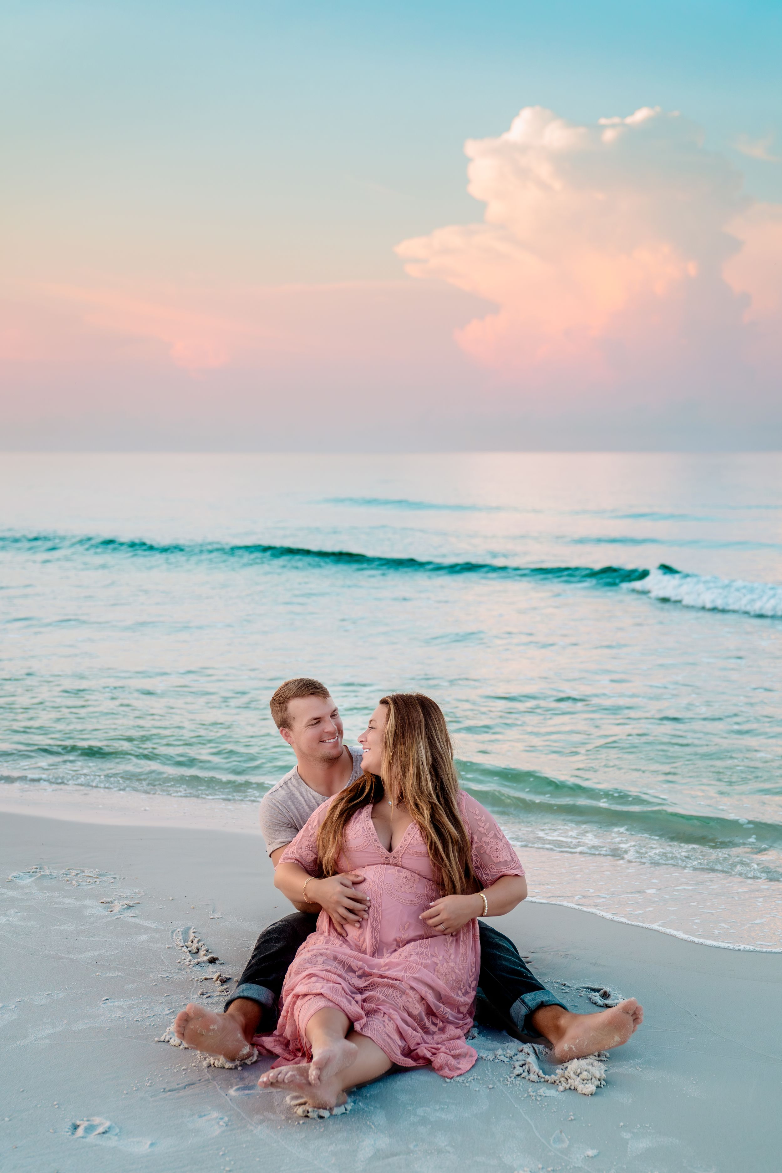 Outdoor maternity session capturing movement and connection, photographed by Sierra Lopez Productions.