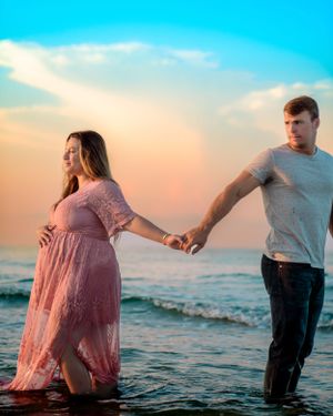Artistic pregnancy photography emphasizing emotion and form, photographed by Sierra Lopez Productions.